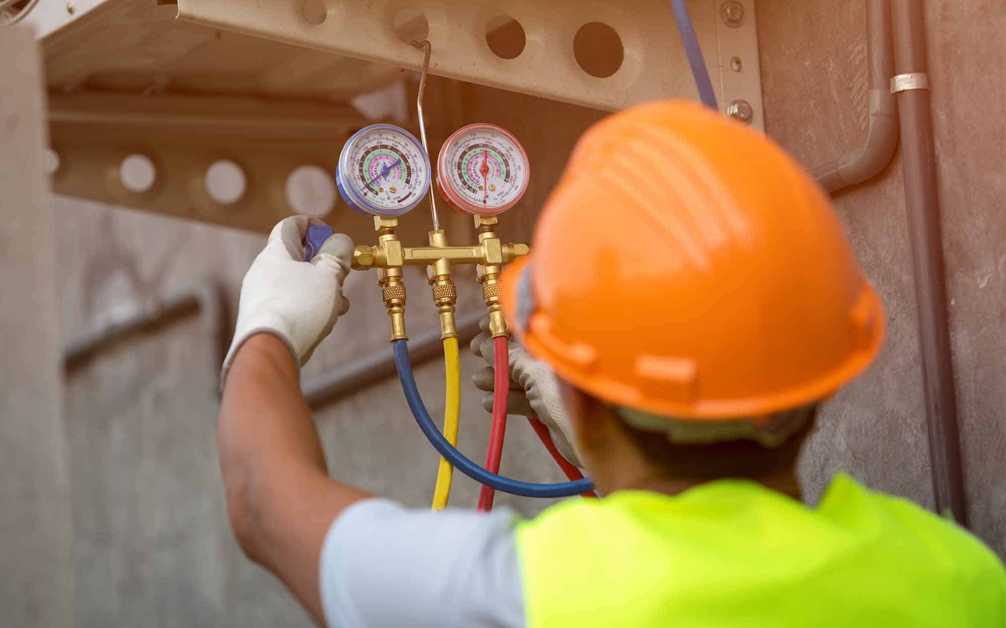 technician checking meter