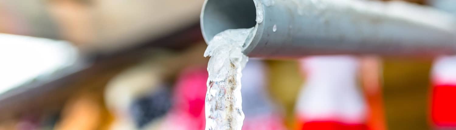 Pipe with long icicle falling out