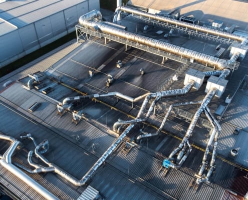 Overhead view of a large commercial warehouse roof